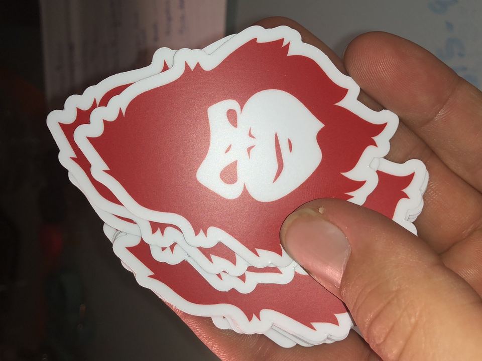 Stack of MAD Monkey die-cut stickers